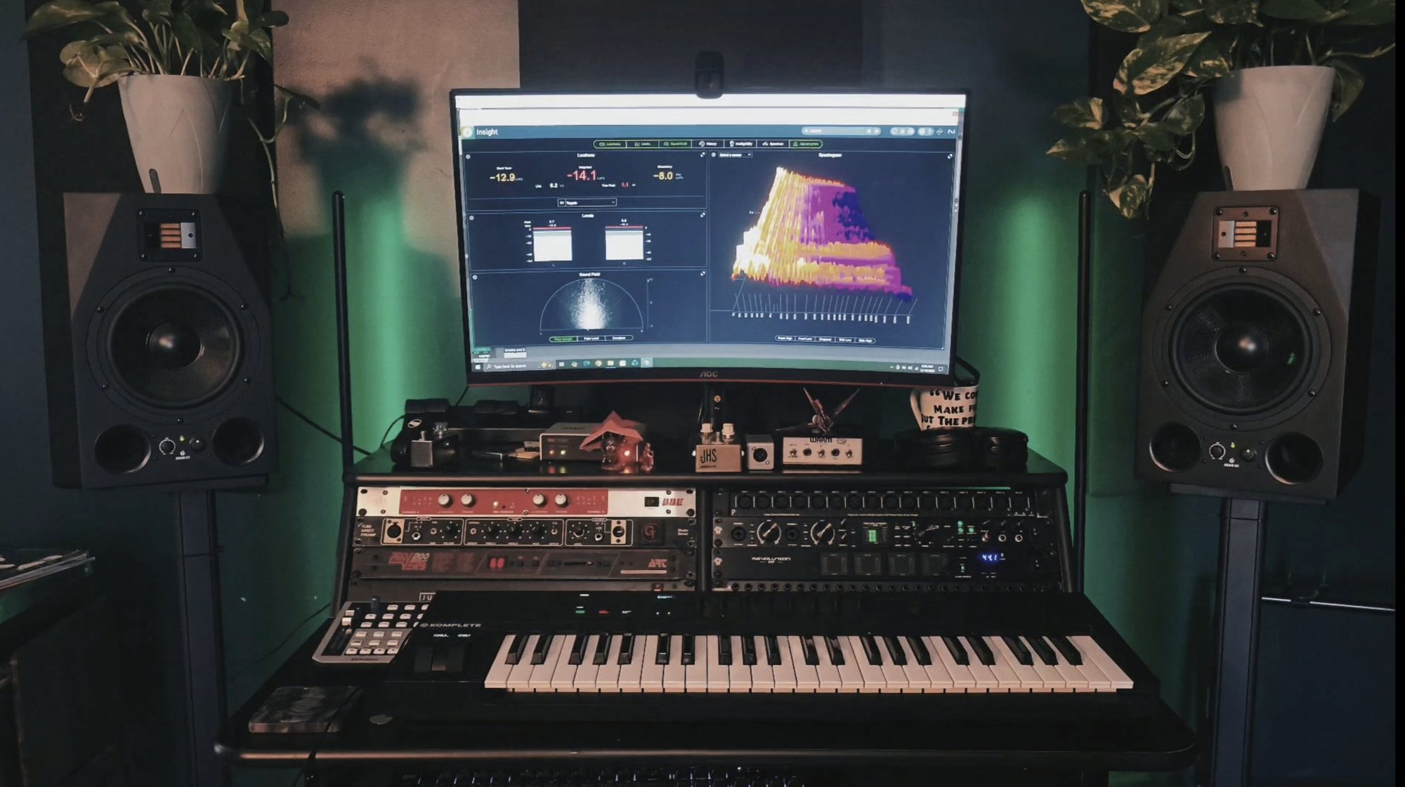 The listening position: ADAM monitors either side of the screen, the outboard rack and keyboard below